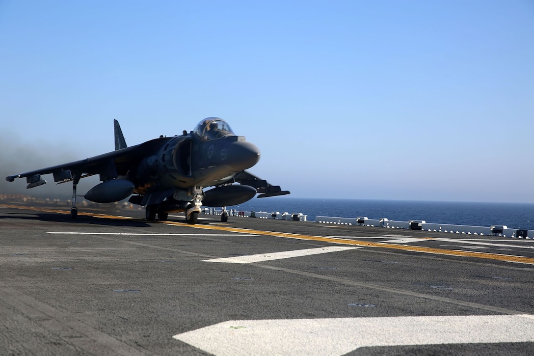 An AV-8B Harrier with Marine Medium Tiltrotor Squadron 163 (Reinforced), 11th Marine Expeditionary Unit, takes off from the flight deck of the USS Makin Island during Amphibious Squadron Marine Expeditionary Unit Integration Training (PMINT) off the coast of San Diego, April 14. The 11th MEU and its counterpart, Amphibious Squadron 5, execute various sea-based missions as part of PMINT. (U.S. Marine Corps photo by Sgt. Melissa Wenger/Released)