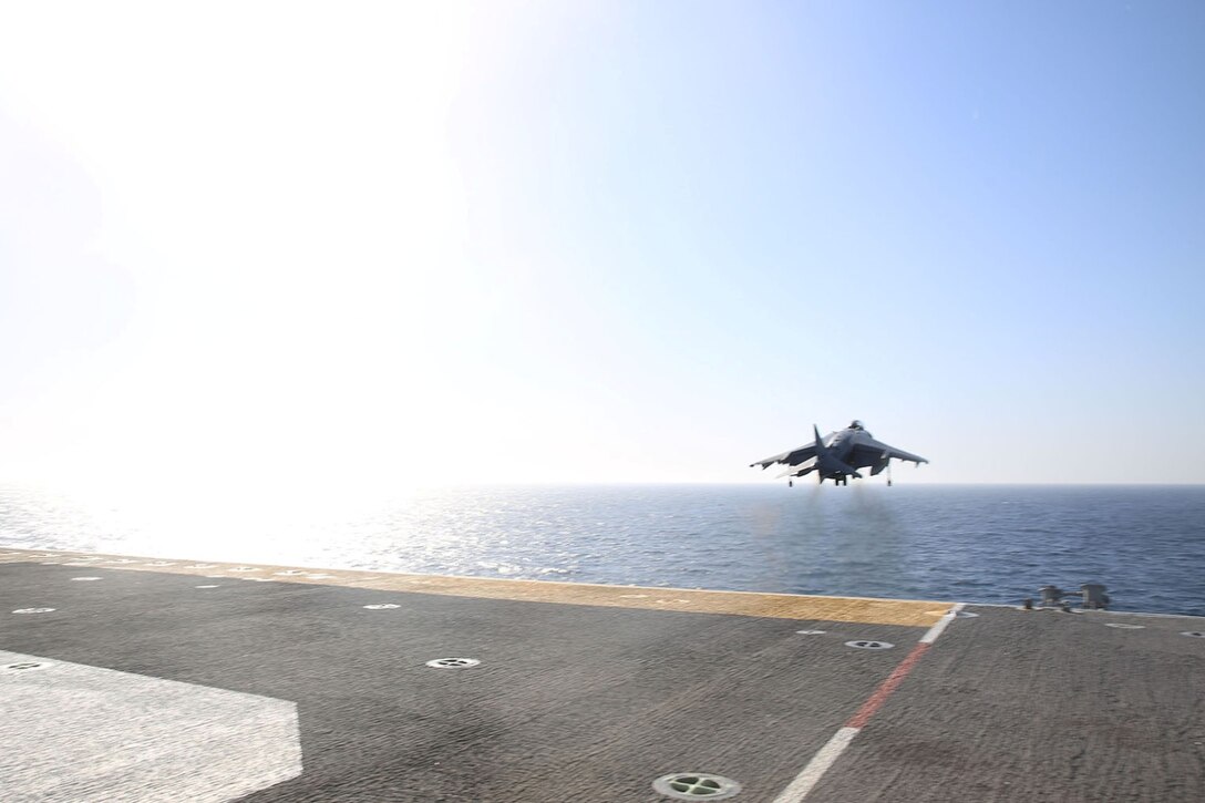An AV-8B Harrier with Marine Medium Tiltrotor Squadron 163 (Reinforced), 11th Marine Expeditionary Unit, takes off from the flight deck of the USS Makin Island during Amphibious Squadron Marine Expeditionary Unit Integration Training (PMINT) off the coast of San Diego, April 14. The 11th MEU and its counterpart, Amphibious Squadron 5, execute various sea-based missions as part of PMINT. (U.S. Marine Corps photo by Sgt. Melissa Wenger/Released)