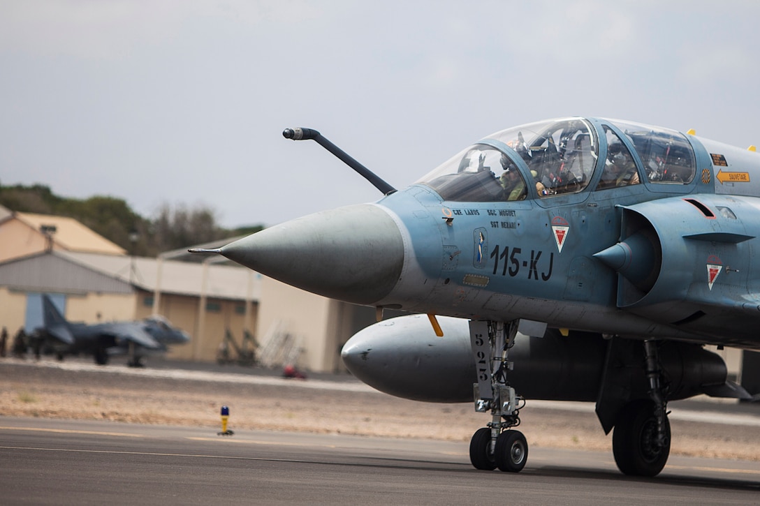 A French air force Mirage 2000 fighter jet with Fighter Squadron 03/011 Corsica taxis to a runway at French Airbase 188 during an air-to-air combat exercise with AV-8B Harriers from Marine Medium Tiltrotor Squadron (VMM) 263 (Reinforced), 22nd Marine Expeditionary Unit (MEU). The 22nd MEU is deployed with the Bataan Amphibious Ready Group as a theater reserve and crisis response force throughout U.S. Central Command and the U.S. 5th Fleet area of responsibility.