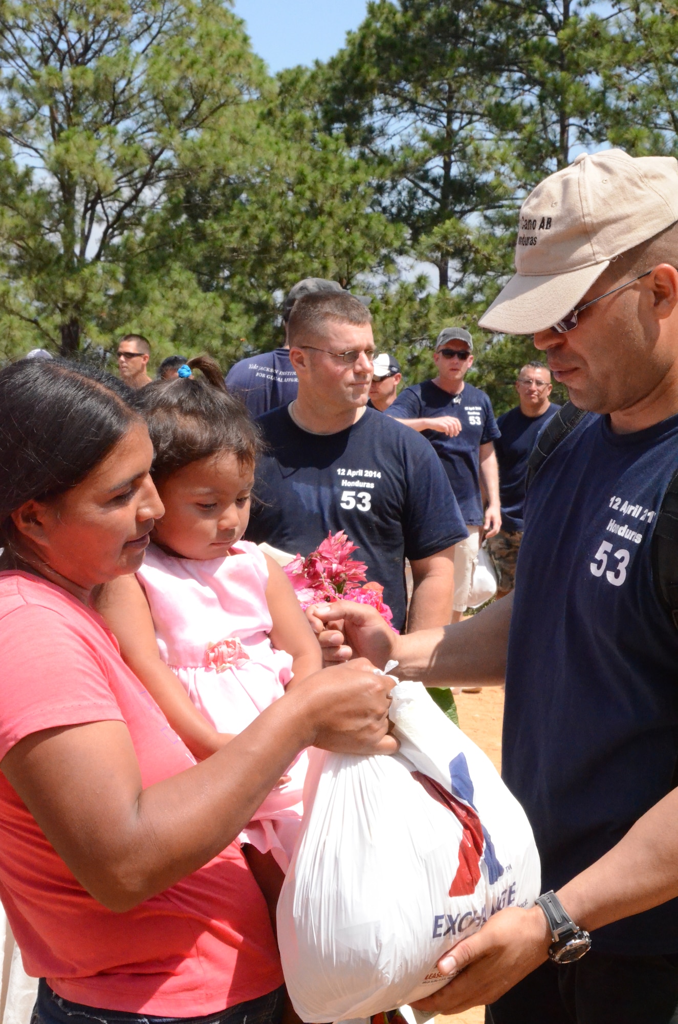 More than 130 members of Joint Task Force-Bravo completed a 6.2 mile round trip hike to deliver more than 3,000 pounds of food and supplies to families in need in the mountain village, April 12, 2014. During the more than three mile trek up the mountain, Task Force members made an elevation gain of 1,600 feet while carrying more than 25 pounds of supplies each. The food and supplies were all purchased with donations made by the members of Joint Task Force-Bravo. (Photo by U. S. Air Force Technical Sgt. Breihan Fetz)