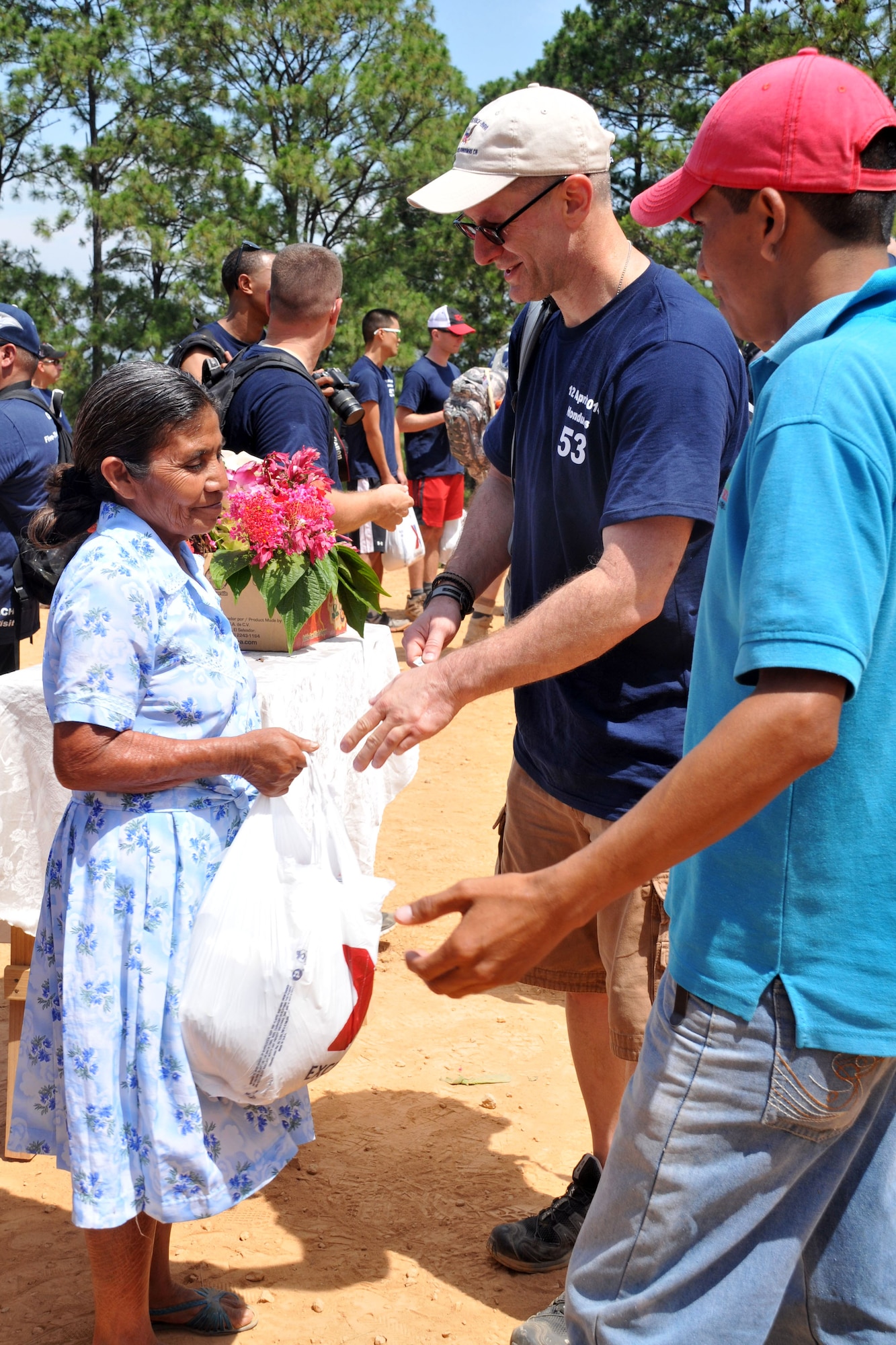 More than 130 members of Joint Task Force-Bravo completed a 6.2 mile round trip hike to deliver more than 3,000 pounds of food and supplies to families in need in the mountain village, April 12, 2014. During the more than three mile trek up the mountain, Task Force members made an elevation gain of 1,600 feet while carrying more than 25 pounds of supplies each. The food and supplies were all purchased with donations made by the members of Joint Task Force-Bravo. (Photo by Ana Fonseca)