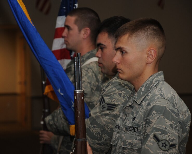 Members of the base Honor Guard present the colors during a training exercise on Barksdale Air Force Base, La., April 15, 2014. The base honor guard covers a 53,000 square mile area for ceremonies between Texas and Louisiana. (U.S. Air Force photo/Staff Sgt. Sean Martin)