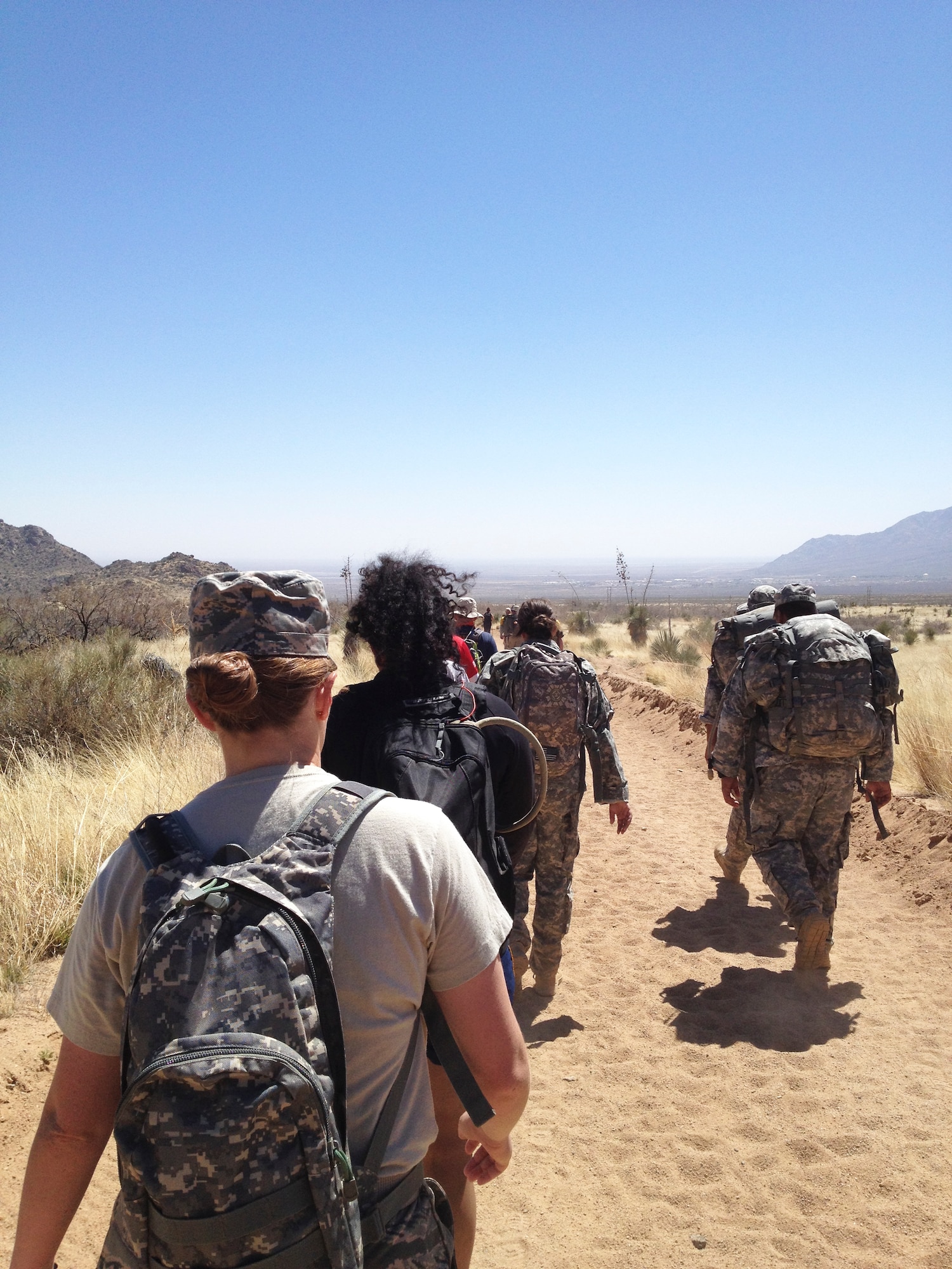 Tech. Sgt. Jennifer Lindner, 412th Operations Group, marches in the 25th Annual Bataan Memorial Death March on March 24, 2014. (Courtesy photo)