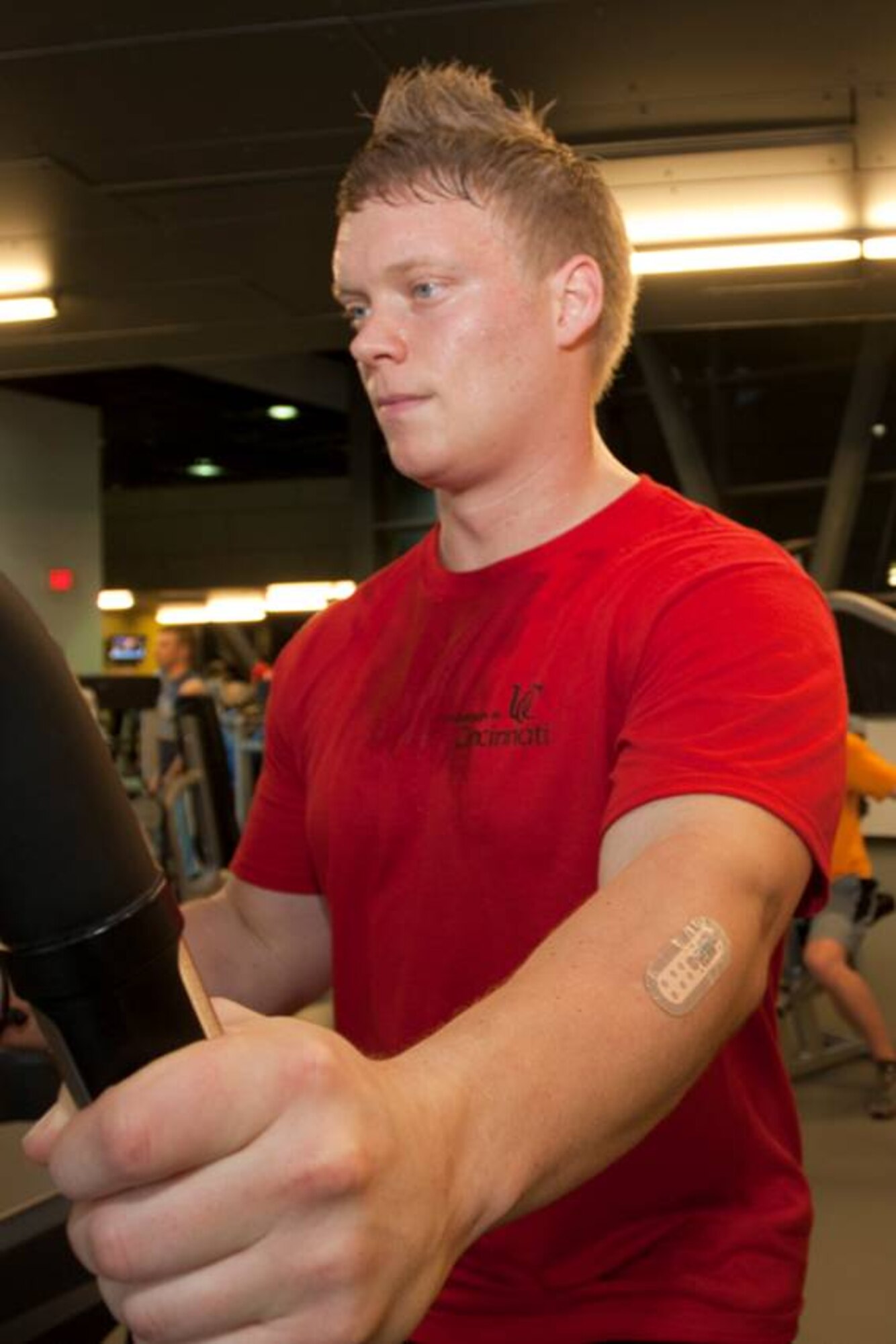 Roger Rose, volunteer, works outs with bandage-like wearable sensor that analyzed his sweat to assess physical and cognitive performance.  The sensors project is a result of the collaborative efforts between the Air Force Research Laboratory and the University of Cincinnati. (Contributed photo)

