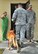 With a final salute from his fellow service members, Retired Military Working Dog Arco walked into the base vet for the last time April 14. (U.S. Air Force Photo by Ashley M. Wright)