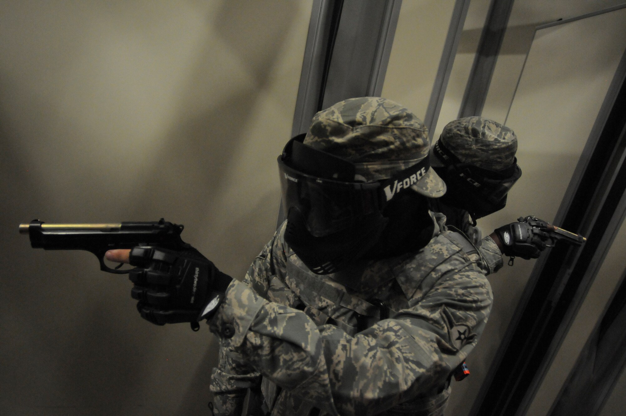 Members of the 125th Security Forces Squadron perform close quarters combat training at Camp Blanding Joint Training Base, Fla. on Apr. 11, 2014. (U.S. Air National Guard photo by Staff Sgt. Jeremy L. Brownfield) (Released)