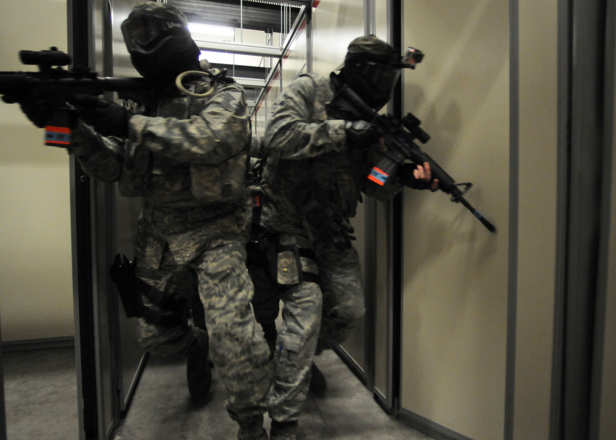 Members of the 125th Security Forces Squadron perform close quarters combat training at Camp Blanding Joint Training Base, Fla. on Apr. 11, 2014. (U.S. Air National Guard photo by Staff Sgt. Jeremy L. Brownfield) (Released)
