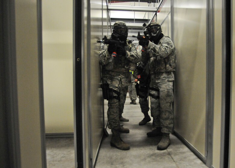 Members of the 125th Security Forces Squadron perform close quarters combat training at Camp Blanding Joint Training Base, Fla. on Apr. 11, 2014. (U.S. Air National Guard photo by Staff Sgt. Jeremy L. Brownfield) (Released)