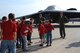 Maj. John Chapman and Capt. James White, volunteers from the 13th Bomb Squadron, field questions before giving “deployers” a tour of a B-2 Spirit at Whiteman Air Force Base, Mo., April 12, 2014. “Deployers” also received briefings from explosive ordnance disposal, security forces, the fire department and medical group volunteers. (U.S. Air Force photo by Airman 1st Class Joel Pfiester/Released)