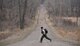 Master Sgt. Robben Todd, 109th Airlift Squadron, runs across the road in Arden Hills, Minn., Apr. 12, 2014. Todd was going through a refresher Survival, Evasion, Resistance and Escape training exercise to maintain his proficiency with the techniques and skills that will keep him alive.
(U.S. Air National Guard photo by Tech. Sgt. Amy M. Lovgren/ Released)
