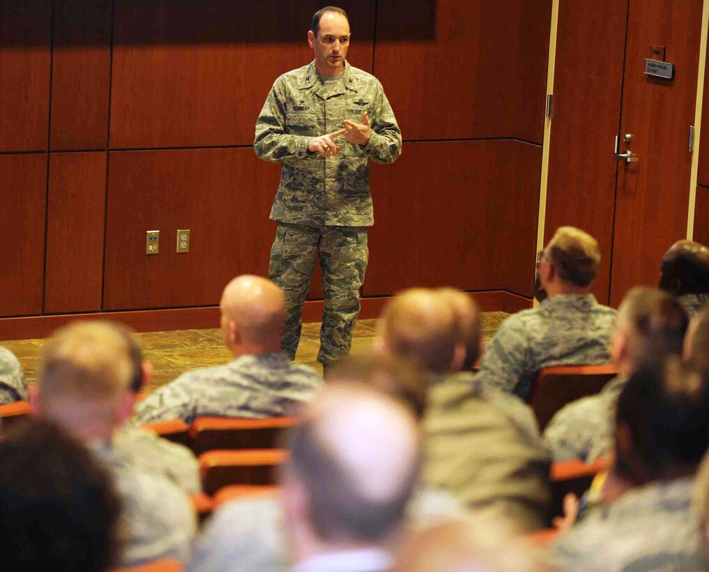 Col. Kevin Kennedy, 28th Bomb Wing commander, welcomes Airmen and members of the Air Combat Command Inspector General team during a briefing in the Deployment Center at Ellsworth Air Force Base, S.D., April 13, 2014. Kennedy thanked the ACC IG team members for helping the base in its efforts to optimize how Airmen complete tasks tied to accomplishing the base’s mission. (U.S. Air Force photo by Airman 1st Class Rebecca Imwalle/ Released)