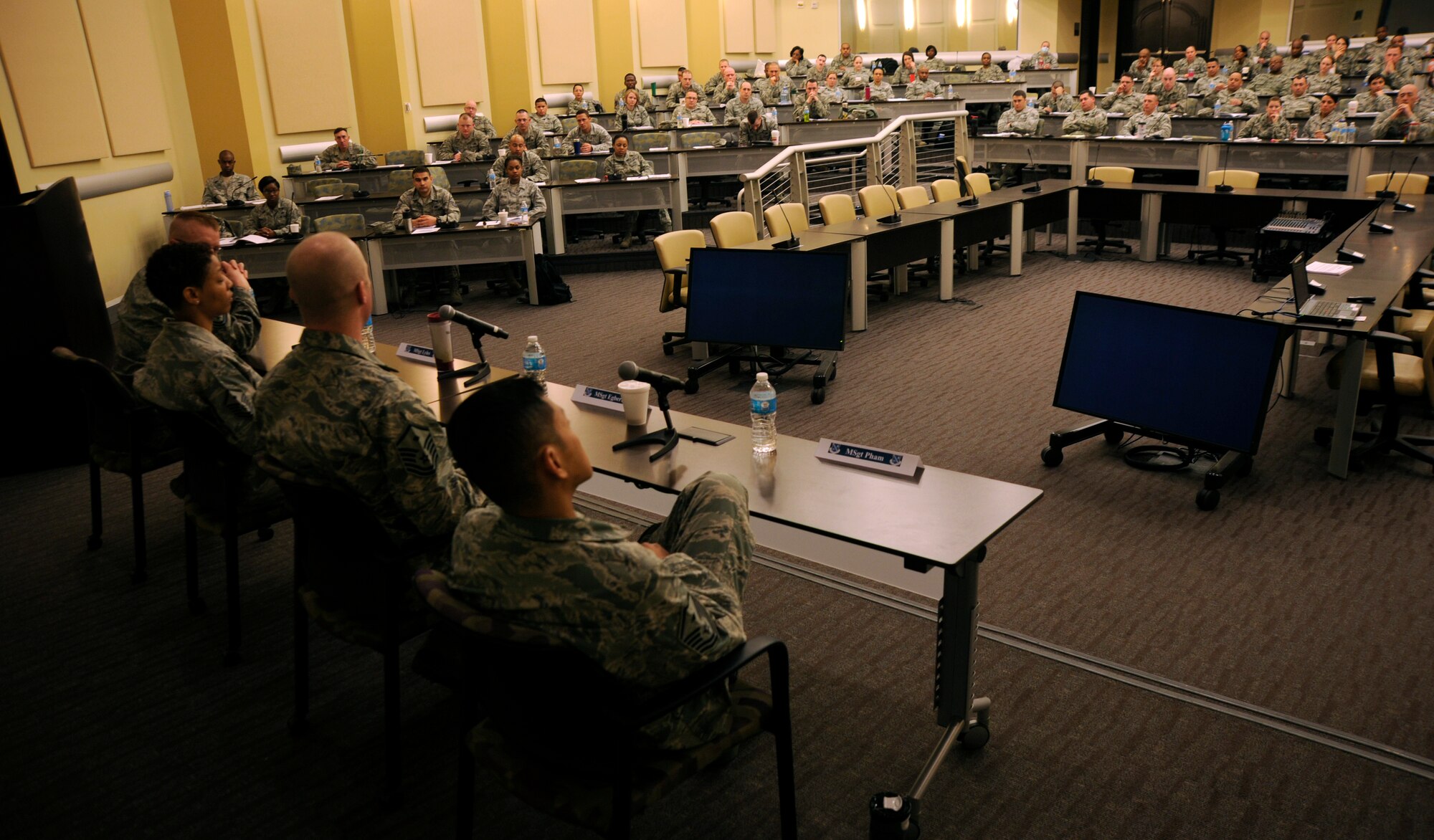 First sergeants from the National Capital Region talk with more than 120 non-commissioned officers from around the area during the Ultimate First Sgt. Experience, April 9, 2014, at Joint Base Andrews, Md. The seminar provided a brief look at the duties and responsibilities of first sergeants and took place from April 7-10. (U.S. Air Force photo/Tech. Sgt. Brian Ferguson)