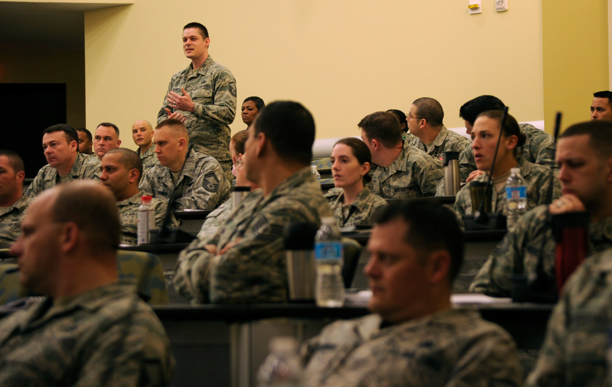 Master Sgt. James Morisette takes the opportunity to ask a question during a command chiefs' briefing at the Ultimate First Sgt. Experience, April 9, 2014, at Joint Base Andrews, Md. More than 120 non-commissioned officers from around the National Capital Region attended the seminar, which provided a brief look at the duties and responsibilities of first sergeants. Morisette is a intelligence analyst at the Defense Intelligence Agency, Fort Meade, Md. (U.S. Air Force photo/Tech. Sgt. Brian Ferguson)