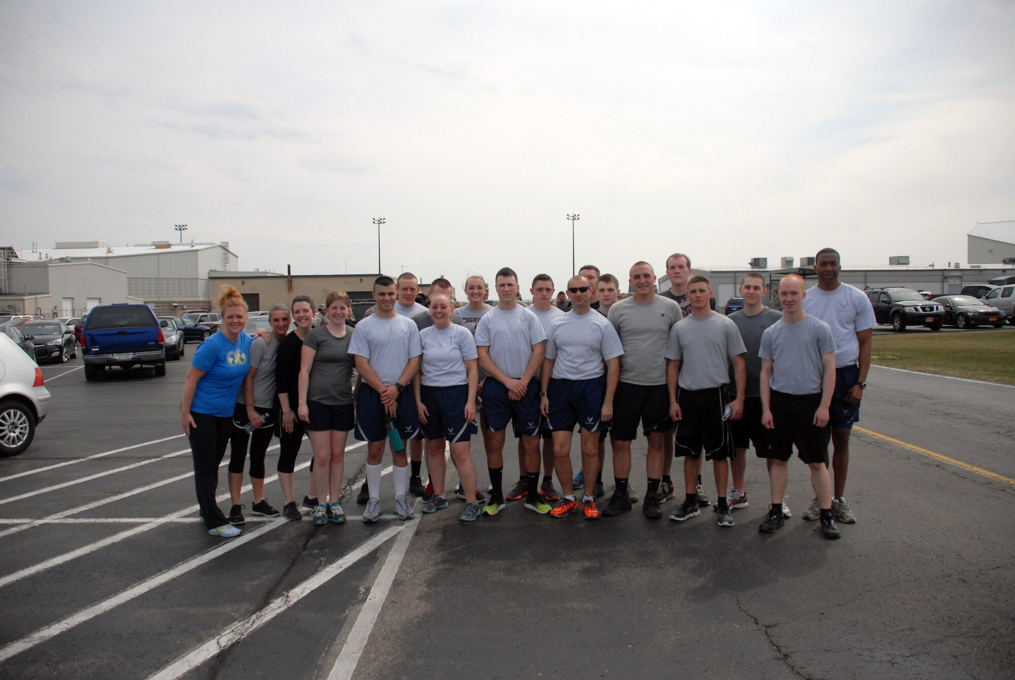 Members of the 107th AW student flight assemble before the start of the “Walk A Mile” Sexual Assault Awareness Walk held here April 13, 2014. (U.S. Air National Guard photo/Senior Airman Daniel Fravel)