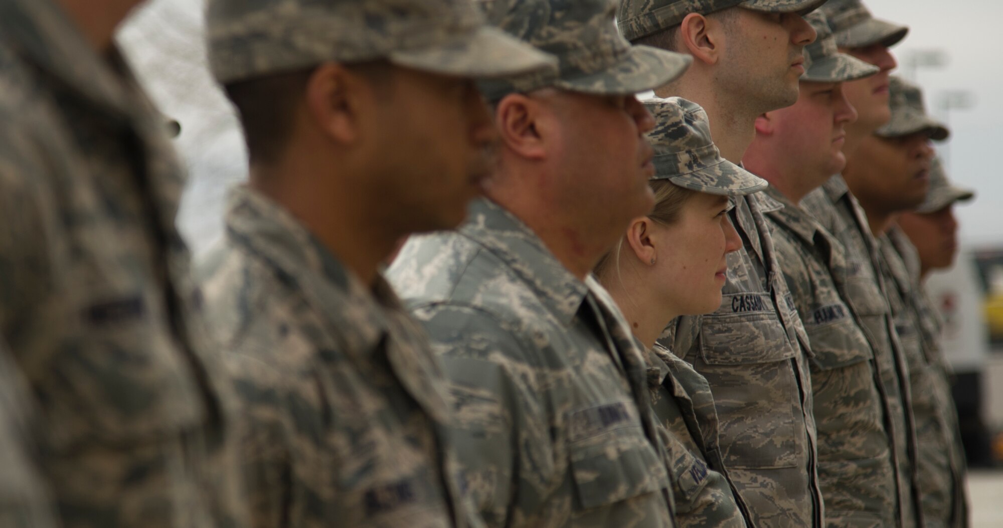 Airmen from the 5th Munitions Squadron stand in formation during a ribbon cutting ceremony at Minot Air Force, N.D., April 10, 2014. The new facility is a 64 personnel work center supporting the maintenance actions on 5th Bomb Wings conventional munitions stockpile. (U.S. Air Force photo/Senior Airman Brittany Y. Auld) 