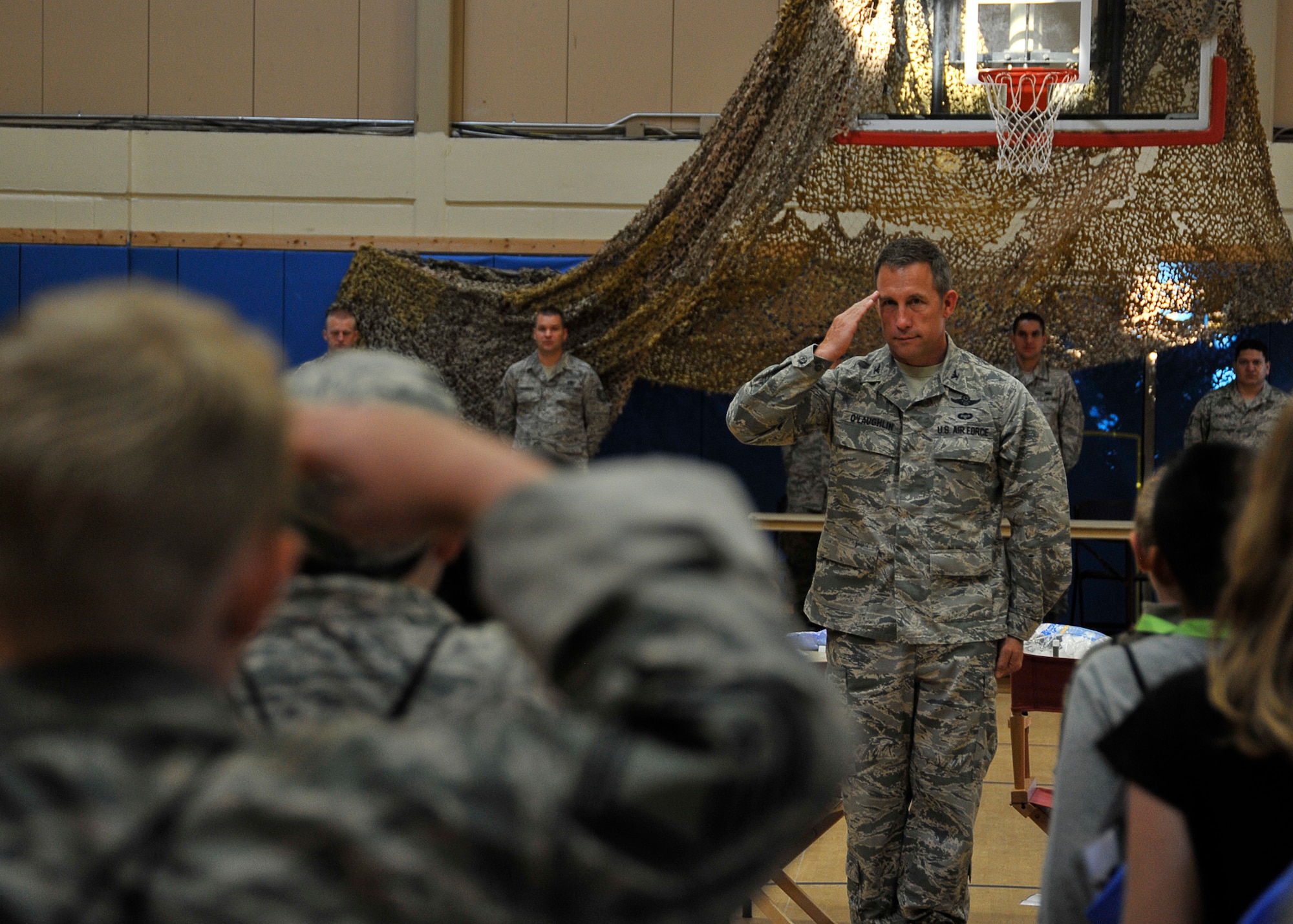 Col. Mark O’Laughlin, 325th Fighter Wing vice commander, pays a visit to the Jr. Raptors April 12 before the children’s mock deployment.  The Jr. Raptors spent the day seeing what processes their parents go through during a deployment. (U.S. Air Force photo by Airman 1st Class Solomon Cook)