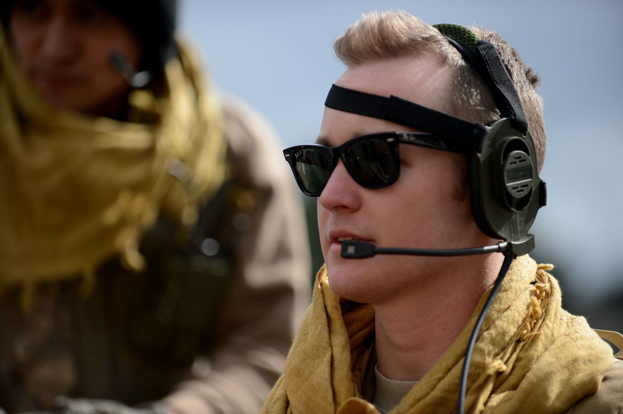 U.S. Air Force Senior Airman Julian Chesser, 606th Air Control Squadron interface control technician from Prattville, Ala., talks about a scenario during a combat readiness training course at Spangdahlem Air Base, Germany, April 15, 2014. The 606th ACS has deployed to Southwest Asia in 2008 and 2010 to provide Air Defense for the Arabian Gulf. (U.S. Air Force photo by Airman 1st Class Kyle Gese/Released)