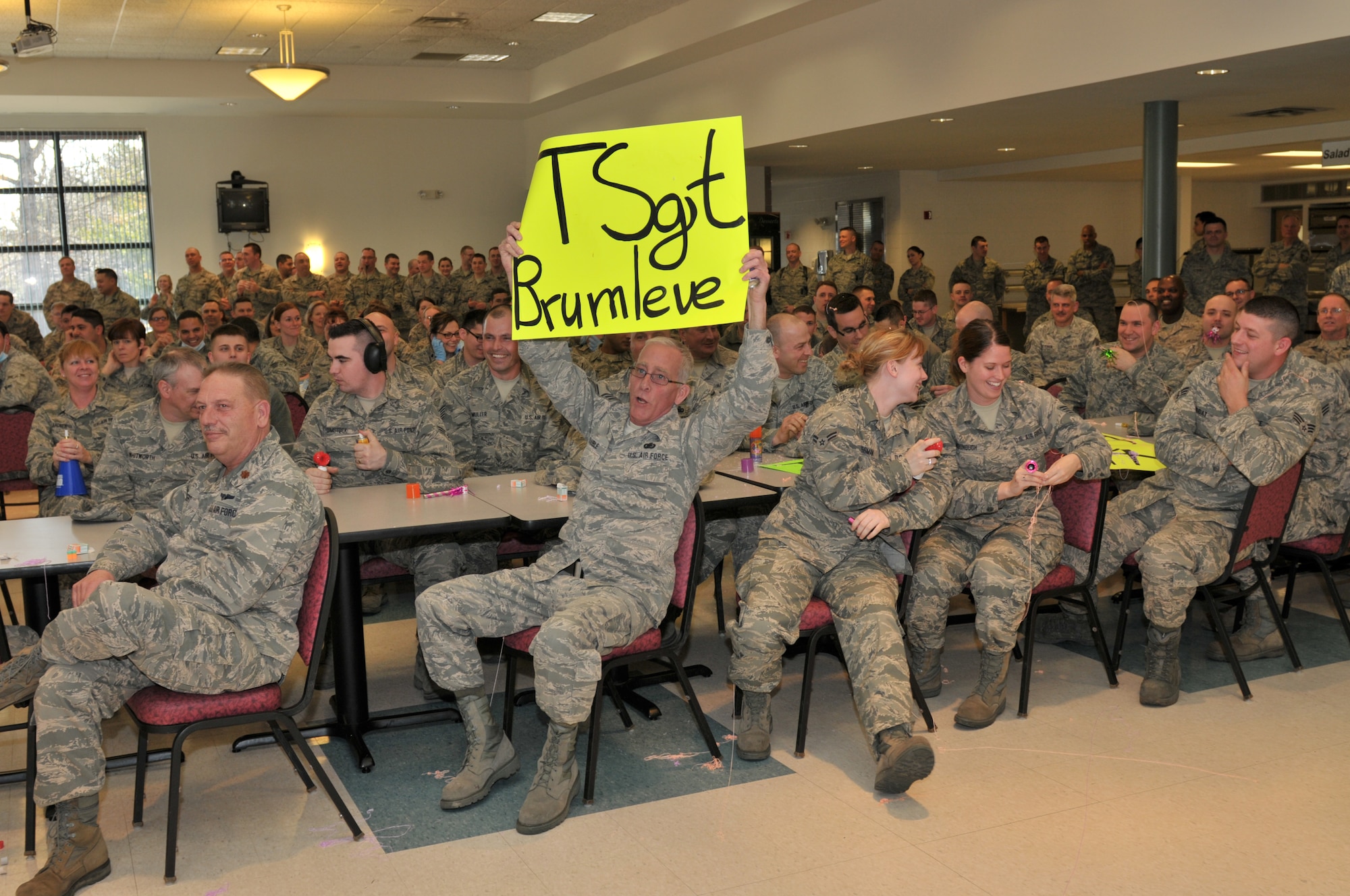 STRATTON AIR NATIONAL GUARD BASE, N.Y. -- 109th Airlift Wing Airmen from all different sections on base cheer on their peers during a promotion recogntion ceremony for E-3s through E-6s on April 6, 2014. Chief Master Sgt. Amy Giaquinto, 109th Airlift Wing command chief, said she hopes the promotion recognition ceremonies will boost morale and promote wing cohesiveness. (Air National Guard photo by Staff Sgt. Benjamin German/Released)