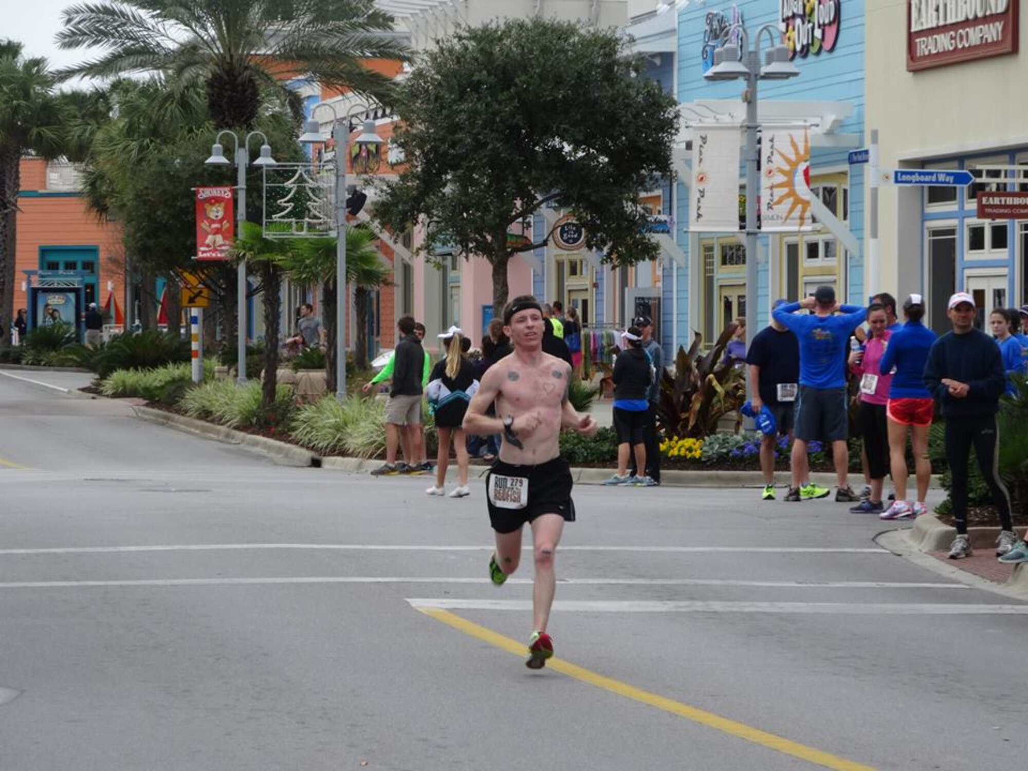 TSgt. Blaine Truman, 43rd Aircraft Maintenance Unit F22 flightline expeditor, competes in the 2013 Run for Redfish Point in Panama City Beach, Fla. (U.S. Air Force courtesy photo)