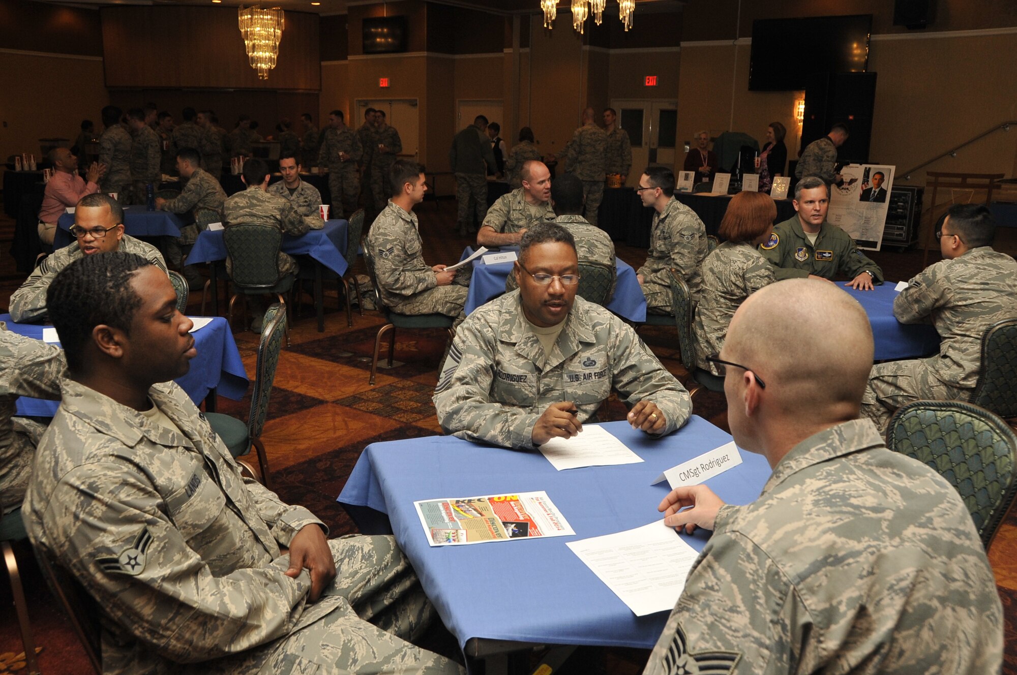 U.S. Air Force Chief Master Sgt. Richard Rodriguez, 35th Mission Support Group superintendent, advises Airmen about career opportunities at Misawa Air Base, Japan, April 11, 2014. Rodriguez spoke to Airmen about his experiences in the Air Force and gave useful advice and tips for success during the Resilient Airman Day speed-mentoring event. (U.S. Air Force photo/Airman 1st Class Patrick S. Ciccarone)