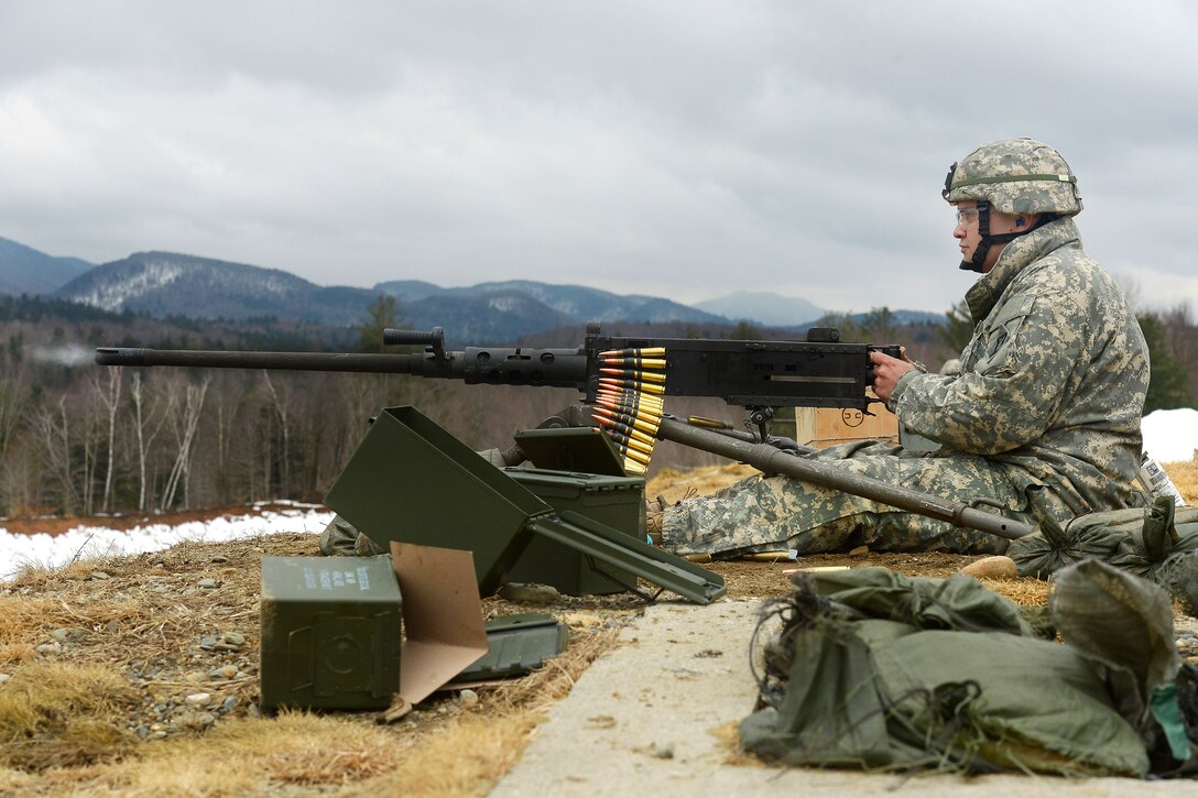 army-spc-raynie-perez-test-fires-a-tripod-mounted-m2a1-machine-gun