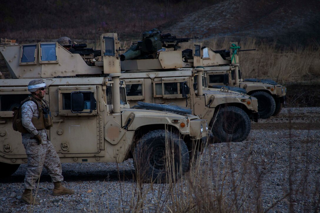 Humvees fire their turret-mounted M240B and M2 .50 caliber machine guns in support of maneuvering forces during a combined arms, live-fire exercise (CALFEX) as part of Exercise Ssang Yong 2014 (SY14) here, April 4. The CALFEX incorporated all aspects of a Marine Air-Ground Task Force, sending a company of Marines into assault with direct fire support from AH-1W Super Cobra and UH-1Y Huey helicopters, AAV’s, Light Armored Vehicle-25’s and M777A1 Lightweight Howitzers. SY14 is conducted annually in the Republic of Korea to enhance interoperability between U.S. and ROK forces by performing a full spectrum of amphibious operations, while showcasing sea-based power projection in the Asia-Pacific. (Official U.S. Marine Corps photo by Sgt. Jonathan G. Wright)