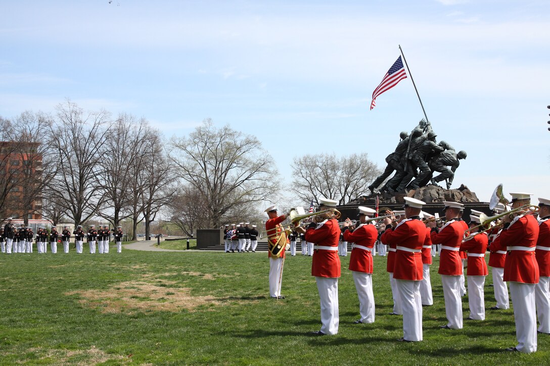 On Saturday, April 12, 2014, the Commandant of the Marine Corps Gen. James F. Amos and the Marines of Marine Barracks Washington, D.C., participated in a ceremony at the U.S. Marine Corps War Memorial in Arlington, Va., in honor of 30th Commandant of the Marine Corps Gen. Carl E. Mundy, Jr., who passed away on April 2, 2014. (U.S. Marine Corps photo by Master Sgt. Kristin duBois/released)