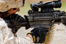 A Marine with Alpha Company, 8th Engineer Support Battalion, 2nd Marine Logistics Group fires an M-249 Squad Automatic Weapon during a machine gun shoot aboard Camp Lejeune, N.C., April 14, 2014.  The hands-on training was particularly important to the battalion’s Marines, who not only conduct their own missions, but regularly augment other units in the field.  (U.S. Marine Corps photo by Cpl. Shawn Valosin)