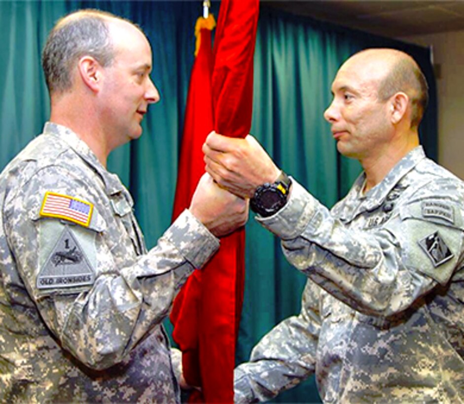 Col. Jose Aguilar assumed command of the Portland District on Tuesday, April 15, 2014. In receiving the organizational colors from Northwestern Division Commander Brig. Gen. John Kem (at the left in this photo), Aguilar assumes the authority and responsibility of the command.