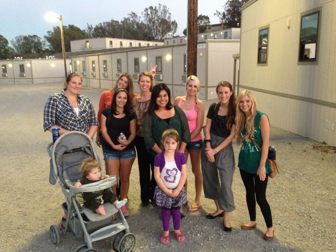Patricia Walker, left, a volunteer with Marine Light Attack Helicopter Squadron 369, stands with other Marine spouses and family members after working on Marine barracks aboard Marine Corps Base Camp Pendleton, Calif. The spouses were prepping the barracks for single Marines returning from the 31st Marine Expeditionary Force.