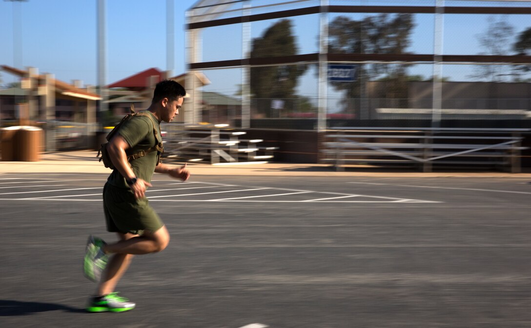 Sgt. Hai Vuong, an imagery analyst with Marine Wing Headquarters Squadron 3, runs to the next station during The Great Sexual Assault Prevention and Response Race aboard Marine Corps Air Station Miramar, Calif., April 15. Participants visited 10 different stations throughout the race, learning facts about sexual assault in the military and how to prevent and respond to it.