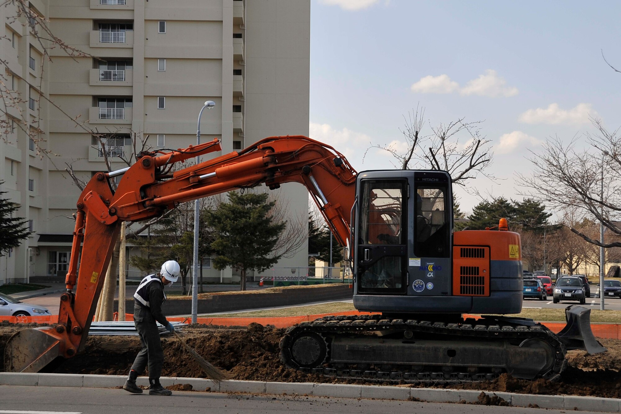 Construction workers from the 35th Civil Engineering Squadron prepare a parking lot for paving at Misawa Air Base, Japan, April 16, 2014. Projects like parking lot re-paving, covered parking, fencing and exterior storage are among the many improvements that the 35 CES are working on at Misawa. (U.S. Air Force photo/Airman 1st Patrick S. Ciccarone)
