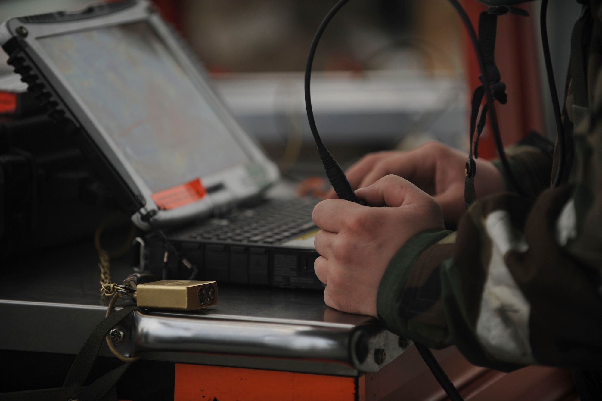 Senior Airman Daniel Noble prepares an F-15E Strike Eagle for takeoff April 16, 2014, Mountain Home Air Force Base, Idaho. Airmen must be able to perform their daily duties in full mission-oriented protective posture gear as if the exercise is a real event. (U.S. Air Force photo by Airman 1st Class Malissa Lott/RELEASED)