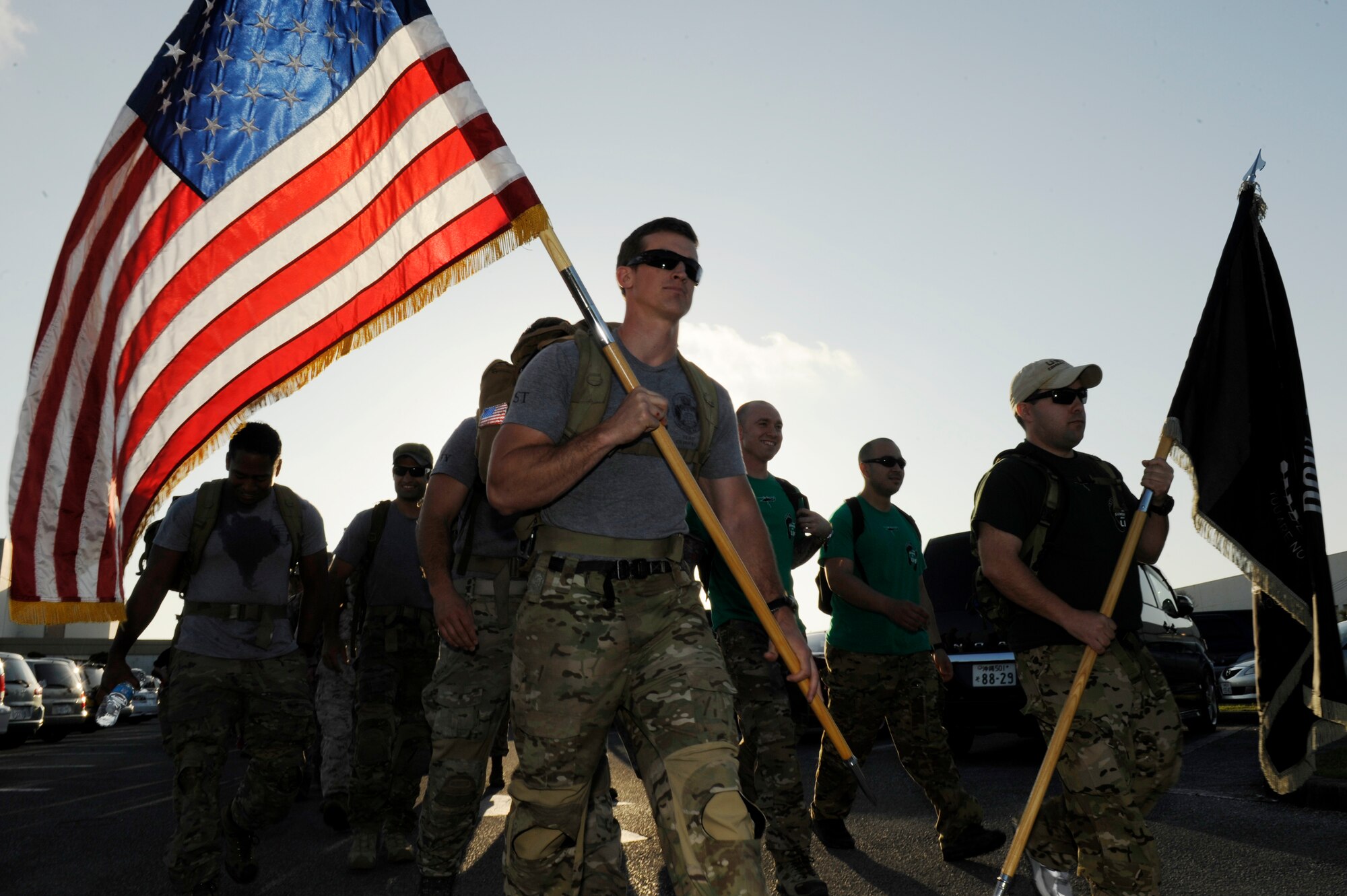 Joint military forces, government civilian employees and their families participate in an 8.5-mile march on Kadena Air Base, Japan, April 12, 2014, to commemorate prisoners of war who served in the Battle of Bataan in the Philippines during World War II. The POWs had to endure a death march of more than 60 miles over five days. (U.S. Air Force photo by Senior Airman Maeson L. Elleman)