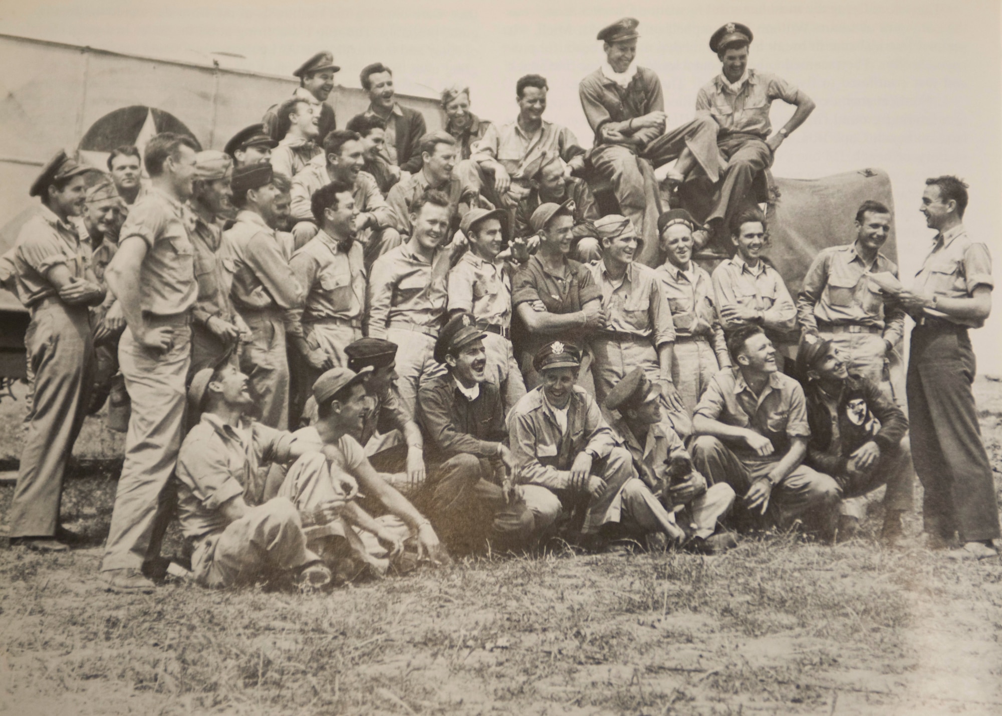 Col. Arthur Salisbury, 57th Fighter Group commander, reads a telegram of congratulations from U.S. Army Chief of Staff Gen. George Marshall to pilots regarding April 18, 1943, “The Palm Sunday Goose Shoot.” (Courtesy Photo) 