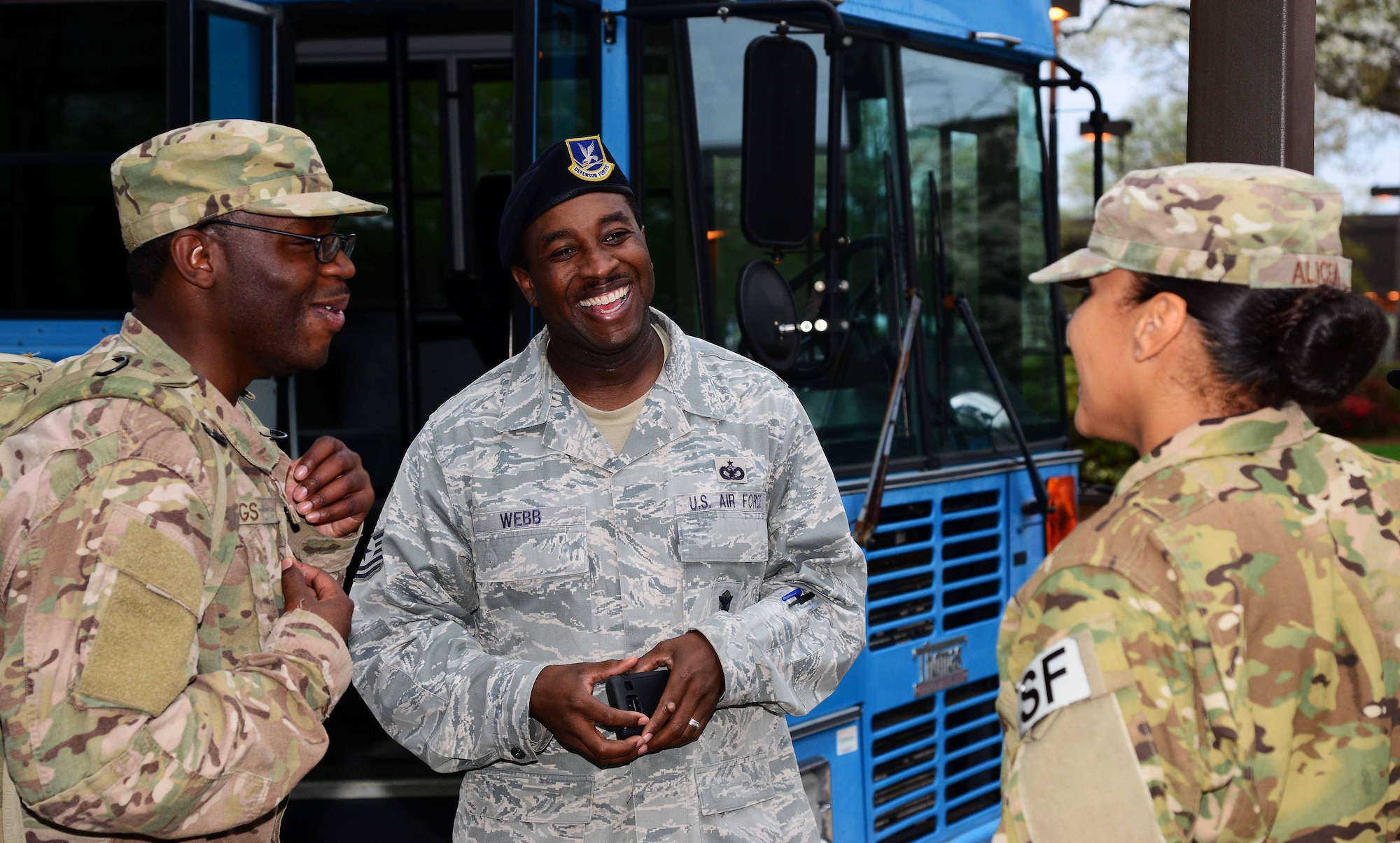U.S. Air Force Tech. Sgt. Raymar Webb, 633rd Security Forces Squadron unit deployment manager, greets Airman 1st Class Martha Alicea, 633rd SFS entry control point specialist, and Senior Airman Deandre Buggs, 633rd SFS response force leader, upon arrival at Norfolk International Airport in Norfolk, Va., April 15, 2014. Twelve Airmen from the 633rd SFS spent six months in Bagram, Afghanistan, in support of Operation Enduring Freedom. (U.S. Air Force photo by Staff Sgt. Antoinette Gibson/Released)