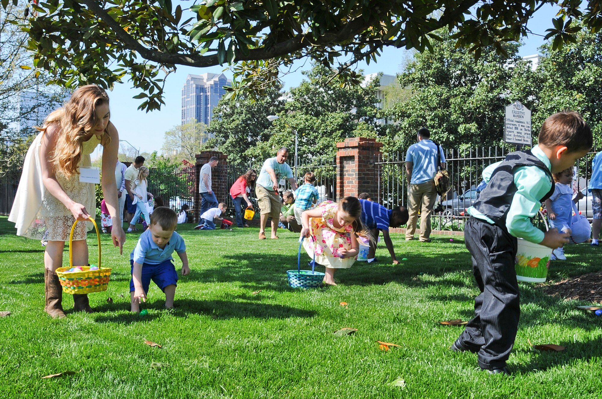 Families from several bases in North Carolina, including Seymour Johnson Air Force Base, Camp Lejeune and Fort Bragg, participate in an Easter egg hunt April 12, 2014, at the Governor’s Executive Mansion in Raleigh, N.C. The event was hosted by Ann McCrory, North Carolina’s First Lady, to celebrate the Month of the Military Child. (U.S. Air Force photo/Tech. Sgt. Colette M. Graham)