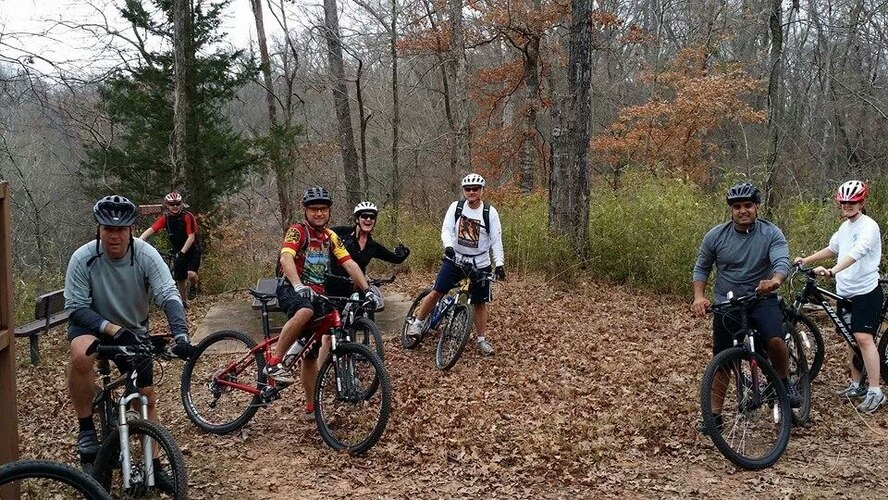 Members of Barksdale’s cycling group pose for a photo before a ride on Barksdale Air Force Base, La. Airmen who participate in the cycling group also volunteer their time to maintain the base biking trails, which include three and seven-mile loops. However, the club isn’t open to just Airmen; anyone with base access is invited to join. (courtesy photo)