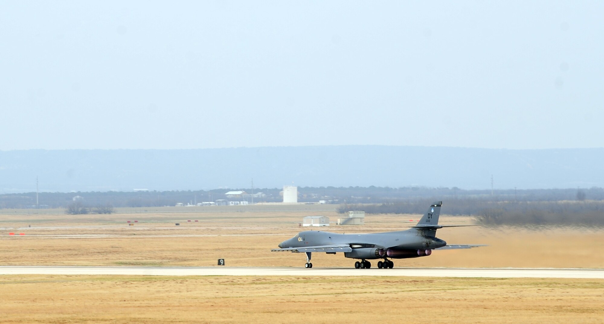 A B-1B Lancer prepares to take off April 2, 2014 at Dyess Air Force Base, Texas. Dyess’s B-1s have received numerous upgrades throughout the years to further establish its air superiority. Although it's close to 30 years old, upgrades to its radar systems and computer software have significantly increased the bombers longevity. (U.S. Air Force photo by Senior Airman Kia Atkins/Released)