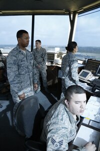 Capt. Ryan Nichols (left) observes as Staff Sgt. Benjamin Minard checks the monitors
March 28 in the Joint Base San Antonio-Lackland's Kelly Field Annex air traffic control
tower. (U.S. Air Force photo by Airman 1st Class Krystal Jeffers)