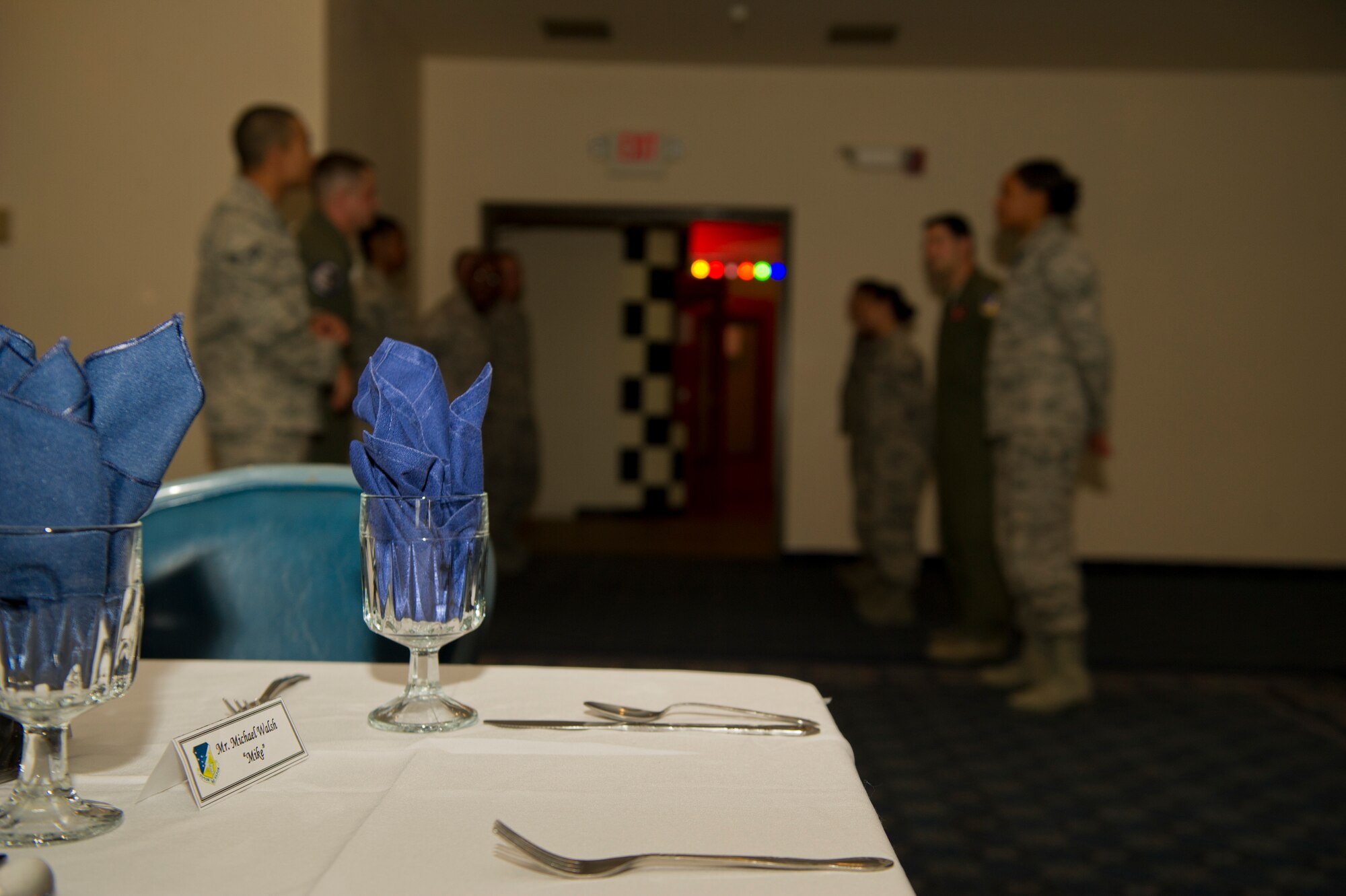 Members of Team Holloman line up in preparation for the arrival of retired General Norton Schwartz for a lunch with Airmen at Holloman Air Force Base, N.M., April 11. The Business Executives for National Security group visits one military installation per month to exchange ideas on common issues and to further public and private partnerships. The visit featured 49th Wing and Team Holloman missions. (U.S. Air Force photo by Airman 1st Class Aaron Montoya / Released)