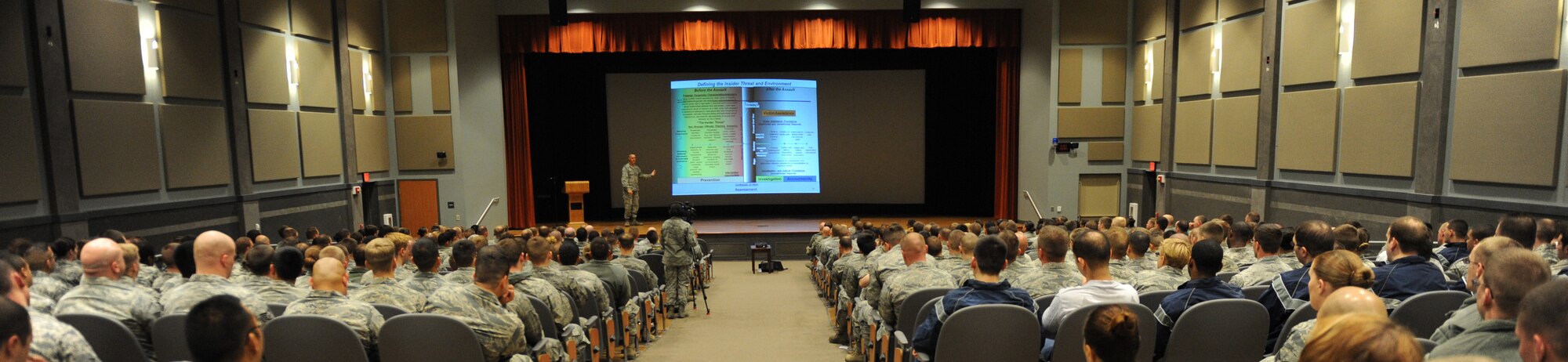 U.S. Air Force Col. Steven Beasley, 7th Bomb Wing vice commander, speaks during the Sexual Assault Prevention and Response stand-down day briefing April 14, 2014, at Dyess Air Force Base, Texas. The Sexual Assault Prevention and Response Program reinforces the Air Force's commitment to eliminate incidents of sexual assault through awareness and prevention training, education, victim advocacy, response, reporting and accountability. The Air Force promotes sensitive care and
confidential reporting for victims of sexual assault and accountability for those who commit these crimes. (U.S. Air Force photo by Airman 1st Class Autumn Velez/Released)