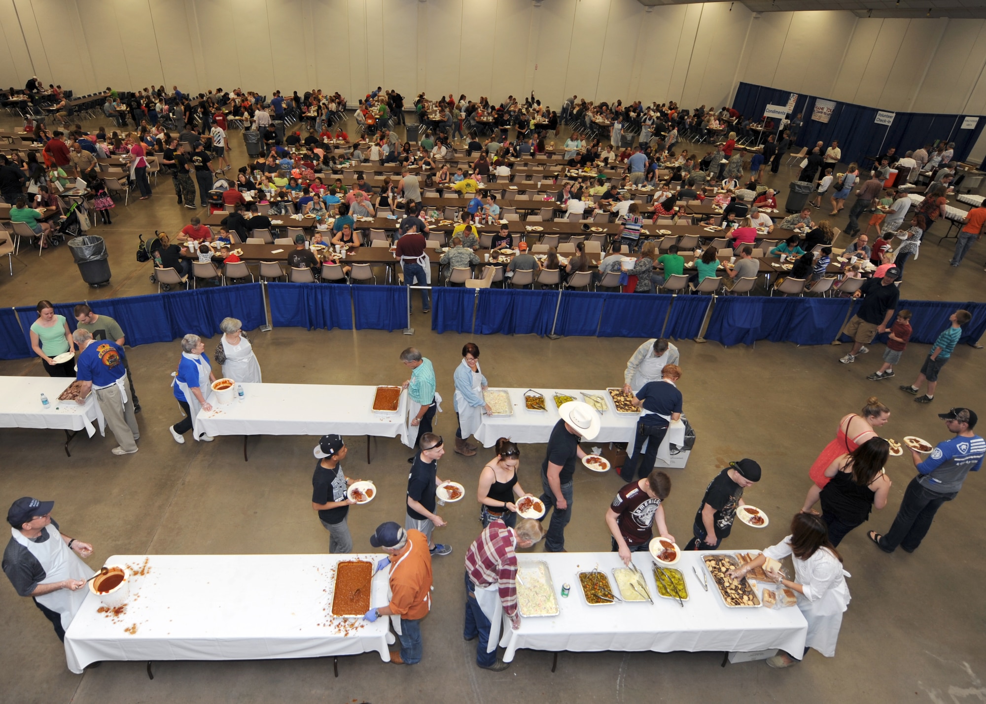 The Abilene Chamber of Commerce Military Affairs Committee held the 49th Annual World’s Largest Barbecue April 12, 2014, at the Civic Center in Abilene, Texas. The MAC holds this event annually as a thank you to the men and women who serve in the armed forces. More than 5,000 active duty military, retirees and their families attended the event. (U.S. Air Force photo by Airman 1st Class Kedesha Pennant/Released)