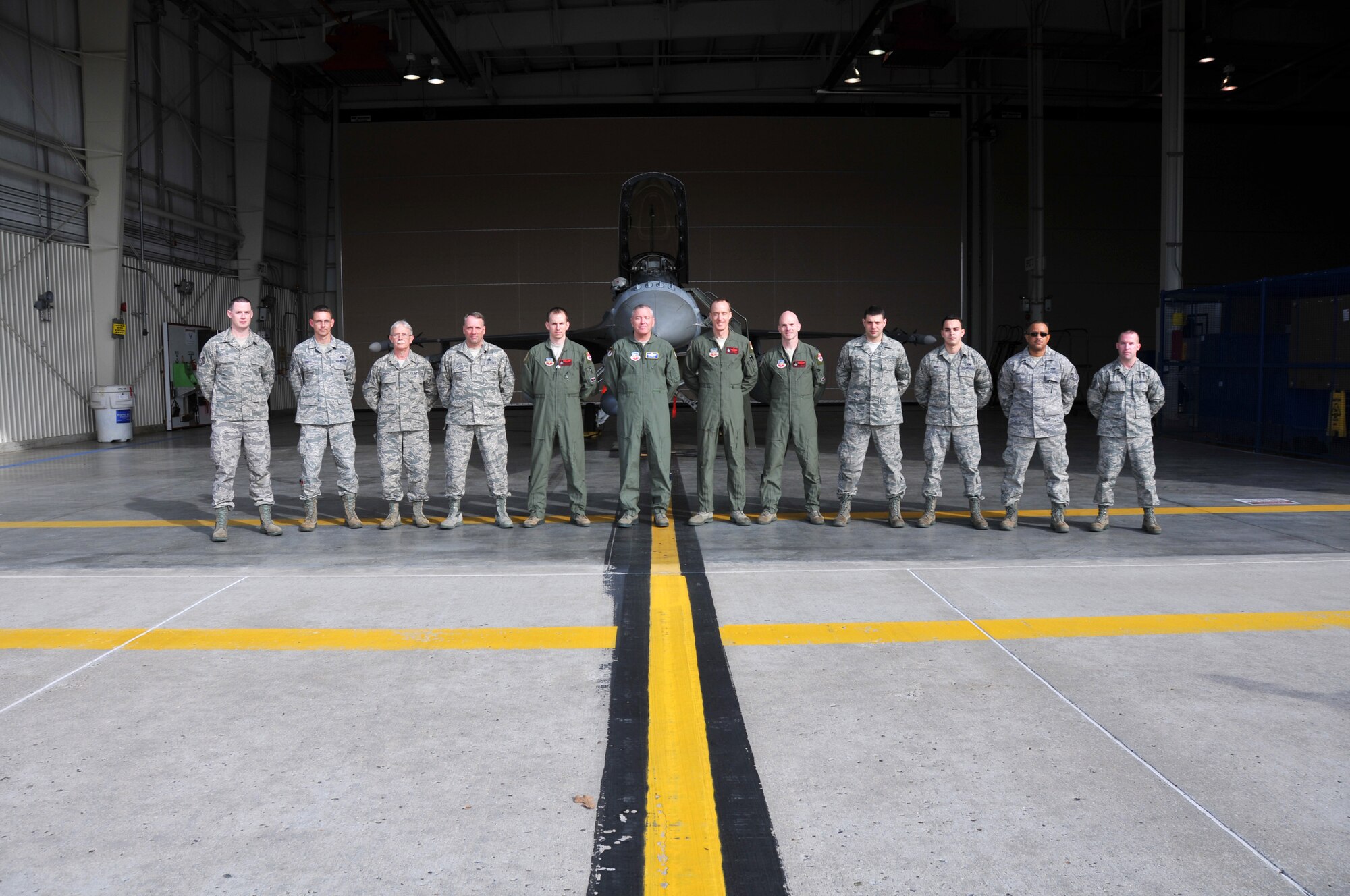 Lt. Gen. William H. Etter, Commander of Continental U.S. North American Aerospace Defense Command Region - 1st Air Force, poses for a group photo with the 177th Fighter Wing Aerospace Control Alert (ACA) site team members during his tour of the Atlantic City Air Guard Base facility in Egg Harbor Township, N.J. on April 2, 2014. (U.S. Air National Guard photo by Master Sgt. Andrew J. Moseley/Released)