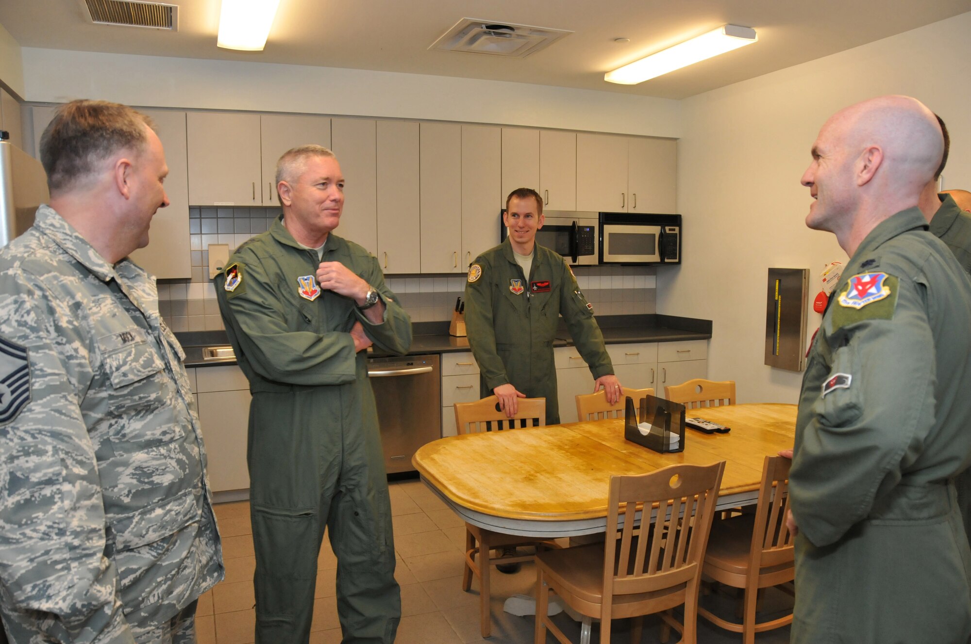 Lt. Gen. William H. Etter, Commander of Continental U.S. North American Aerospace Defense Command Region - 1st Air Force, tours the 177th Fighter Wing Aerospace Control Alert (ACA) site and talks to unit members about the kitchen at the Atlantic City Air Guard Base facility in Egg Harbor Township, N.J. on April 2, 2014. (U.S. Air National Guard photo by Master Sgt. Andrew J. Moseley/Released)