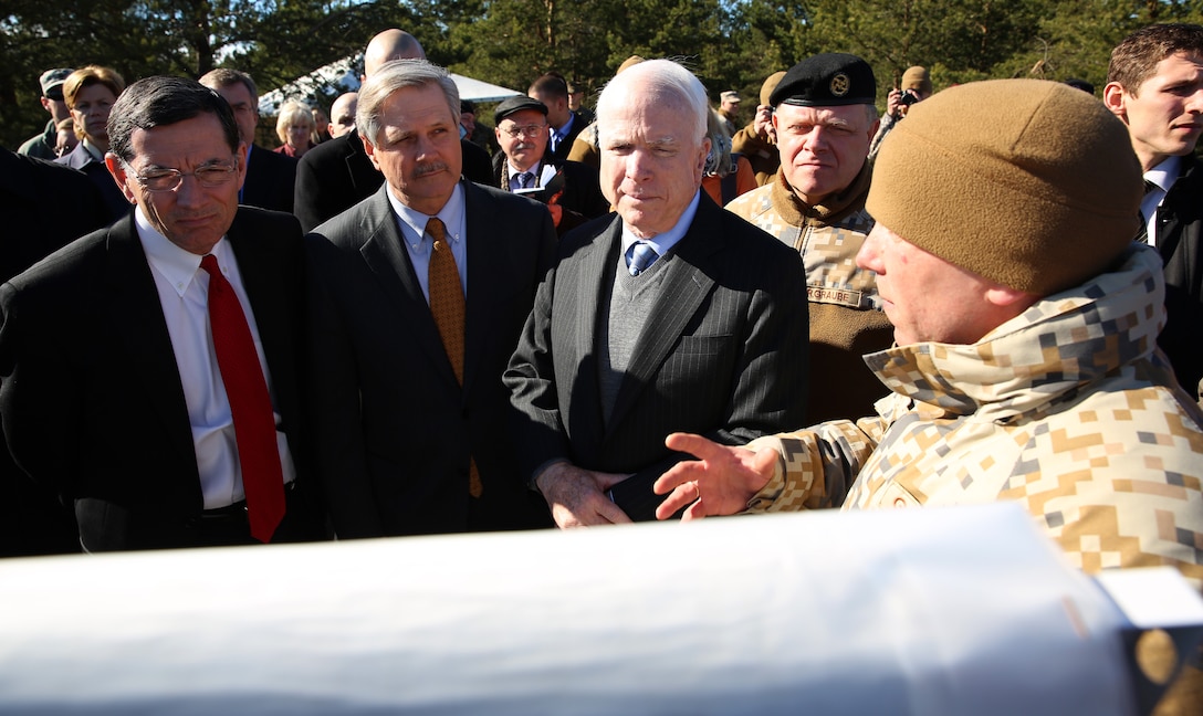 (Left to right) U.S. Senators John Barrasso (R-WY),  John Hoeven (R-ND), John McCain (R-AZ), Latvian Chief of Defense Lt. Gen. Raimonds Graube, and Latvian Lt. Col. Gunars Kaulins, the exercise director of exercise Summer Shield, discuss the interoperability between U.S. and Latvian service members during Summer Shield during their visit to a range near Camp Adazi, Latvia, April 15, 2014. United States Marines with 3rd Battalion, 8th Marine Regiment, 2nd Marine Division assigned to Black Sea Rotational Force 14.2 are participating in Summer Shield in Latvia. This is the 11th iteration of the Summer Shield exercise, a joint staff planning and live-fire maneuver event designed to enhance the NATO force’s capacity and capability to integrate combined arms and maneuver at the battalion and brigade level. It also increases partner capacity, promotes regional stability, and enhances Latvian, Lithuanian, Estonian, and U.S. interoperability as NATO allies. (Official Marine Corps photo by Lance Cpl. Scott W. Whiting, BSRF PAO/ Released)