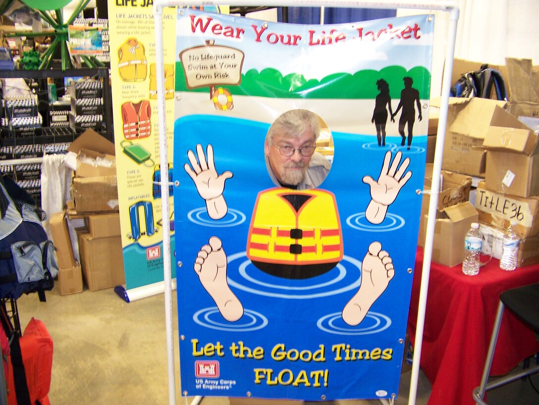 David Cable, recipient of a National Water Safety Congress letter of commendation, spreads the water safety message at the USACE Water Safety Booth at the 2014 Indianapolis Boat & Travel Show.
