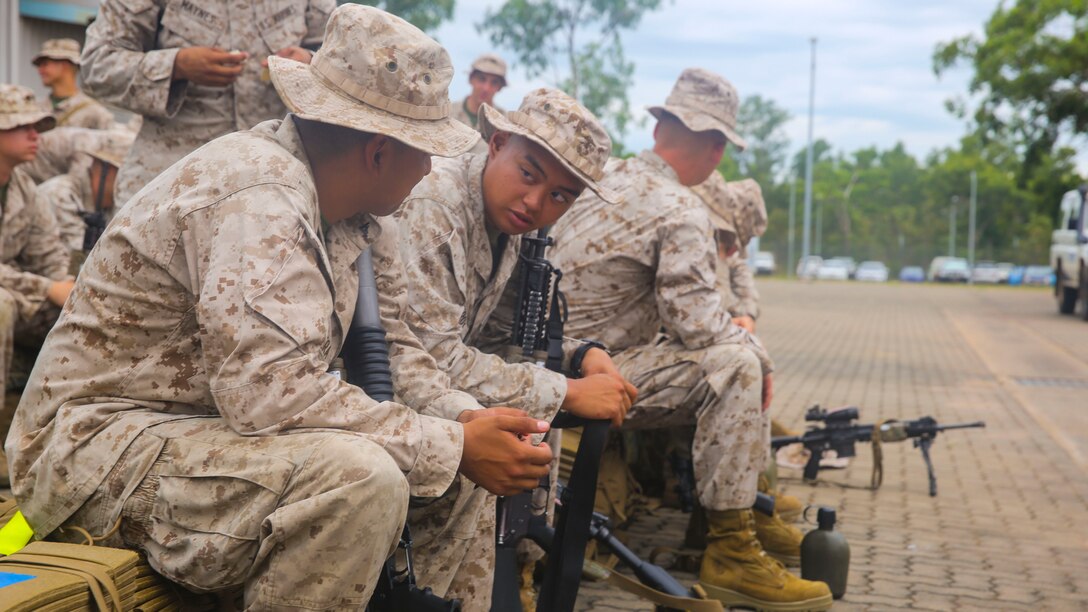 Marines with Alpha Company, 1st Battalion, 5th Marine Regiment, Marine Rotational Force – Darwin, conduct a range movement aboard Robertson Barracks, April 15, 2014. The range movement was more than three miles and was designed to acclimate the Marines to hiking in the Northern Territory’s humid climate. After the hike, Marines zeroed in their weapons and gave Soldiers in the Australian Army a chance to fire their rifles.