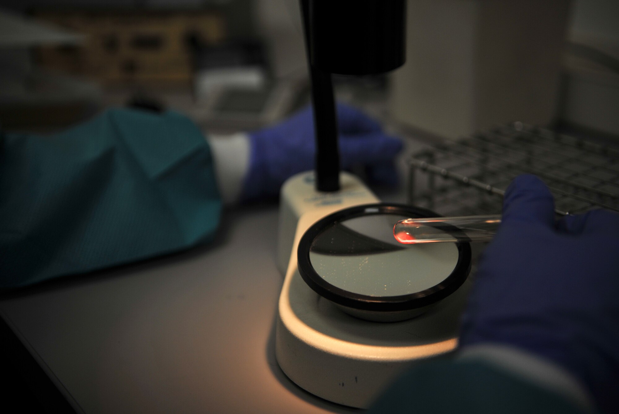 Staff Sgt. Hayli Ward, 51st Medical Support Squadron medical laboratory technician, reads a reagent reaction in the 51st Medical Group at Osan Air Base, Republic of Korea, April 17, 2014. Different reagents bond with certain blood antigens allowing lab technicians to determine a person’s blood type. (U.S. Air Force photo/Airman 1st Class Ashley J. Thum)