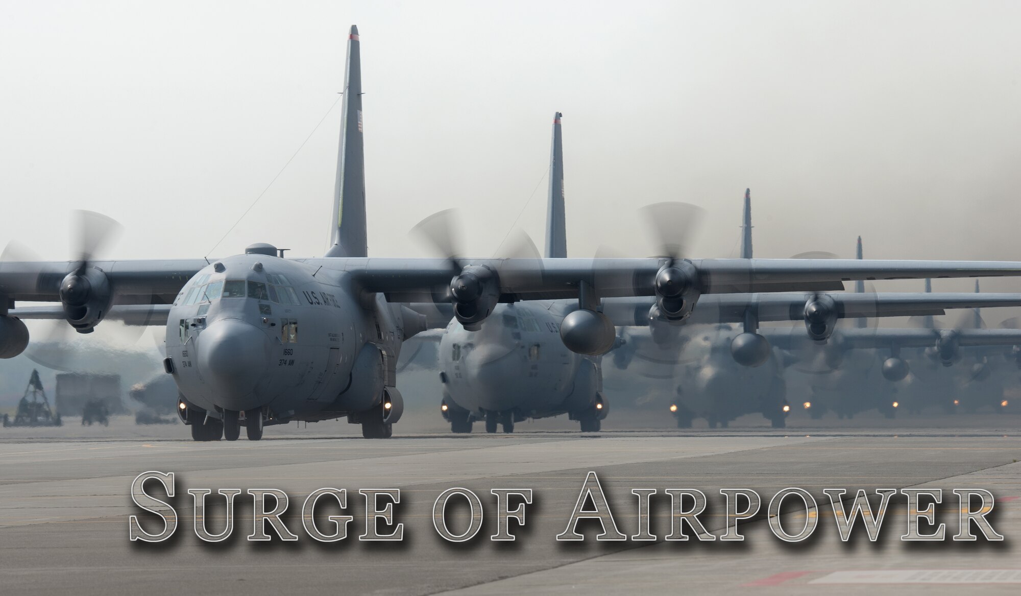 Six C-130 Hercules from the 36th Airlift Squadron taxi out to support regional operations at Yokota Air Base, Japan, April 16, 2014. The exercise tested Yokota’s ability to perform large-force employment and tactics. (U.S. Air Force photo illustration by Osakabe Yasuo/Released)